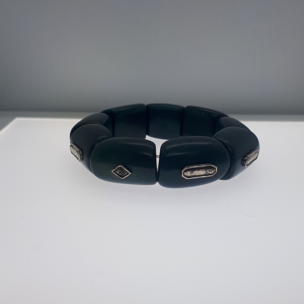 Chunky bracelet w/ Stirling silver accents.